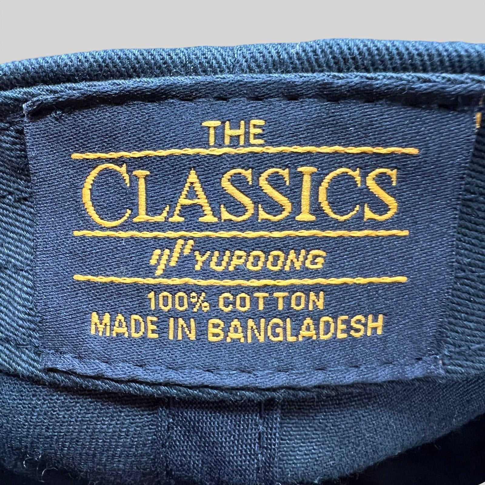 Raree Finds Anti Social Social Club hat interior label showing Yupoong The Classics branding on black cotton fabric