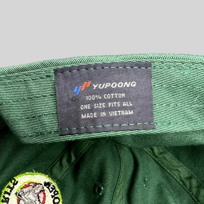 Raree Finds forest green Yupoong cotton strapback hat interior label showing brand and manufacturing details