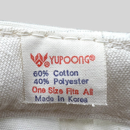 Raree Finds vintage Yupoong hat interior tag showing 60 percent cotton and 40 percent polyester blend made in Korea