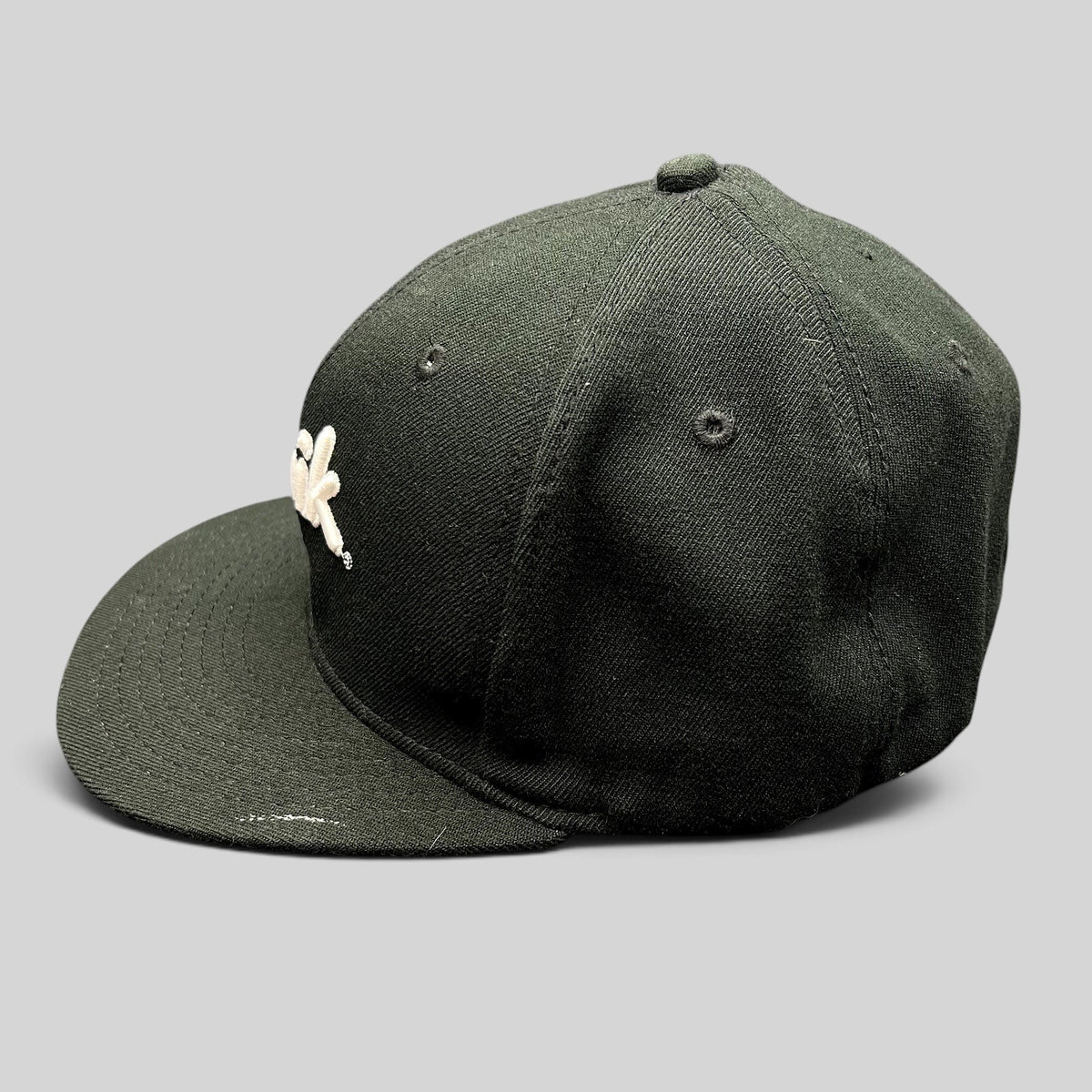 Raree Finds Zhik limited edition black fitted sailing cap with white logo embroidery and geometric underbrim detail.