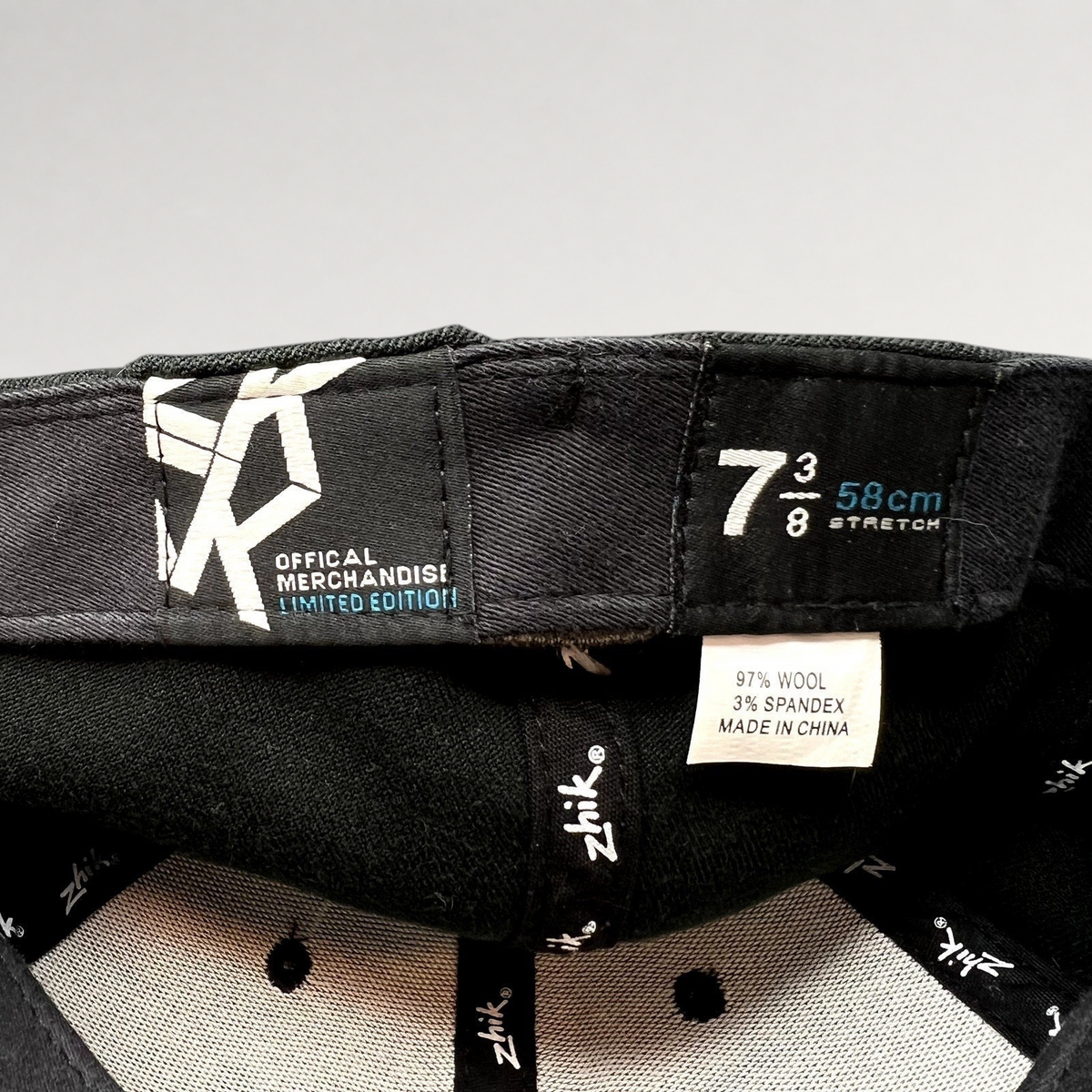 Raree Finds Zhik limited edition fitted cap interior label showing size 7 3/8 and wool blend material tag
