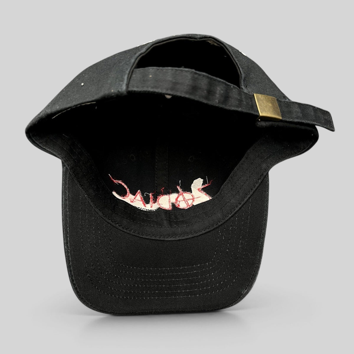 Raree Finds black cotton strapback hat from the 2007 Zodiac Cannes Film Festival promo with adjustable metal buckle.