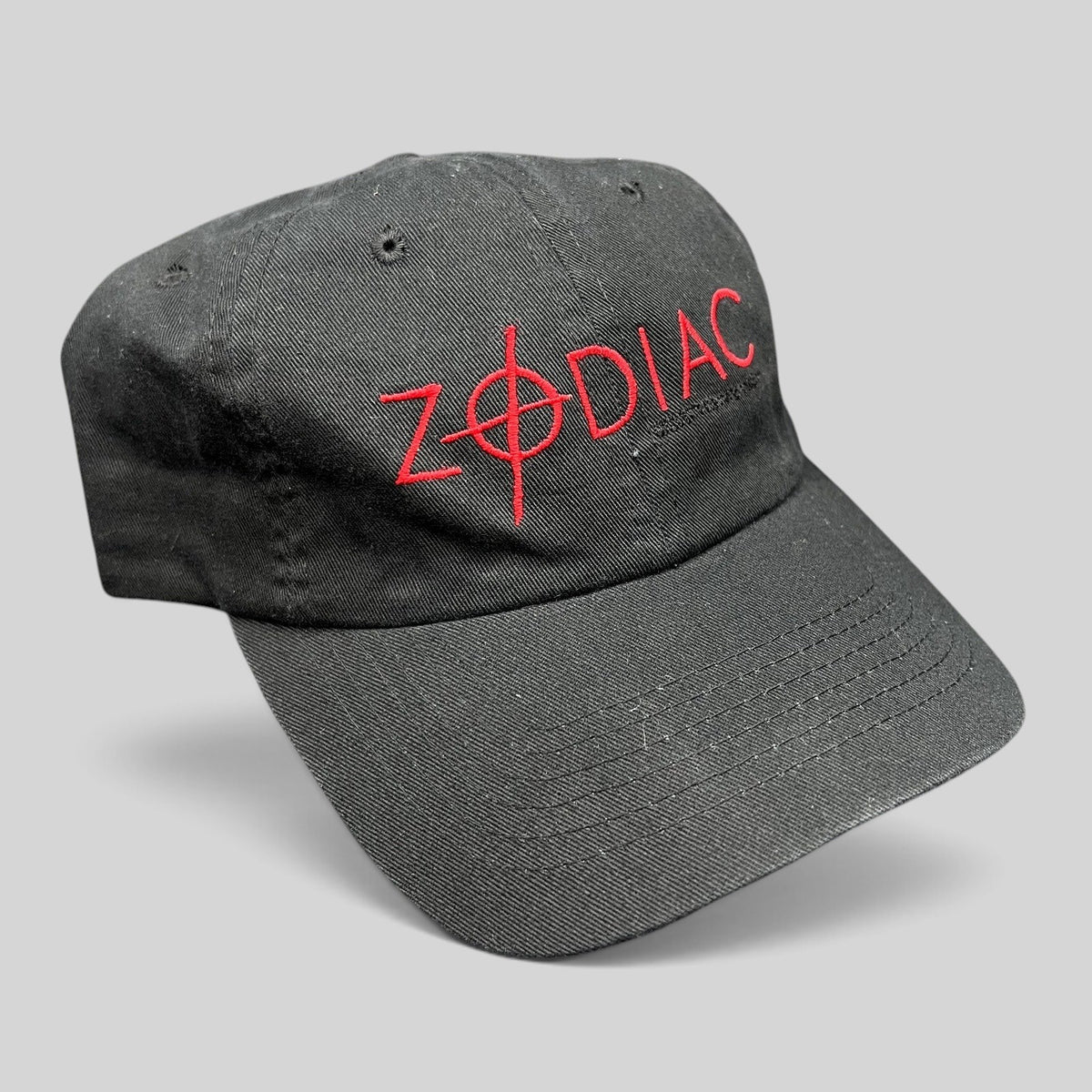 Raree Finds black cotton strapback hat featuring red embroidered ZODIAC movie logo with crosshair detail
