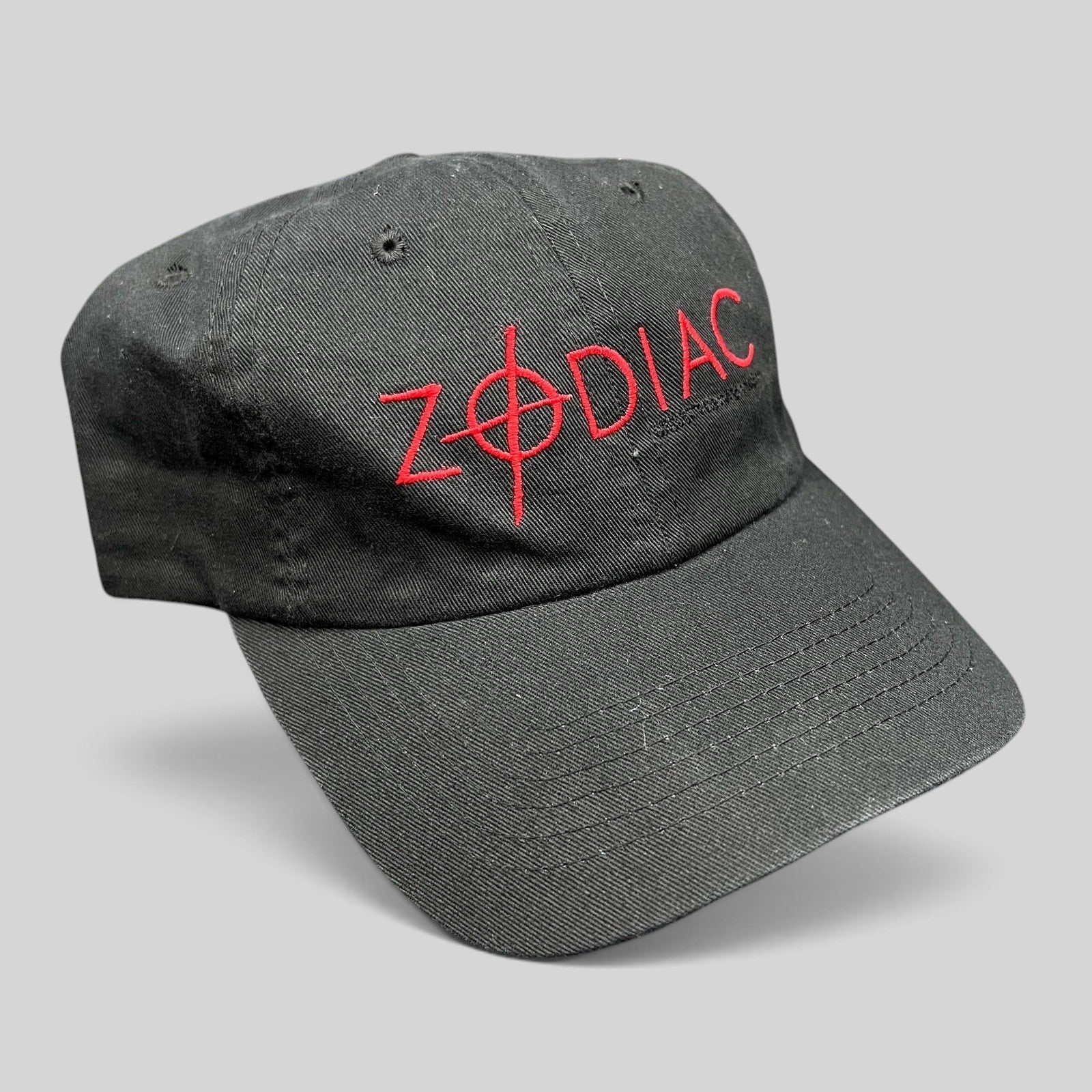 Raree Finds black cotton strapback hat featuring red embroidered ZODIAC movie logo with crosshair detail