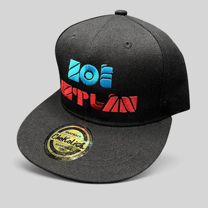 Raree Finds black Chokolids snapback hat featuring embroidered turquoise and red Zoe Aztlan album graphics on front