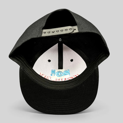 Raree Finds black Chokolids snapback hat featuring interior embroidered Zoé Aztlán album graphics on the front panel