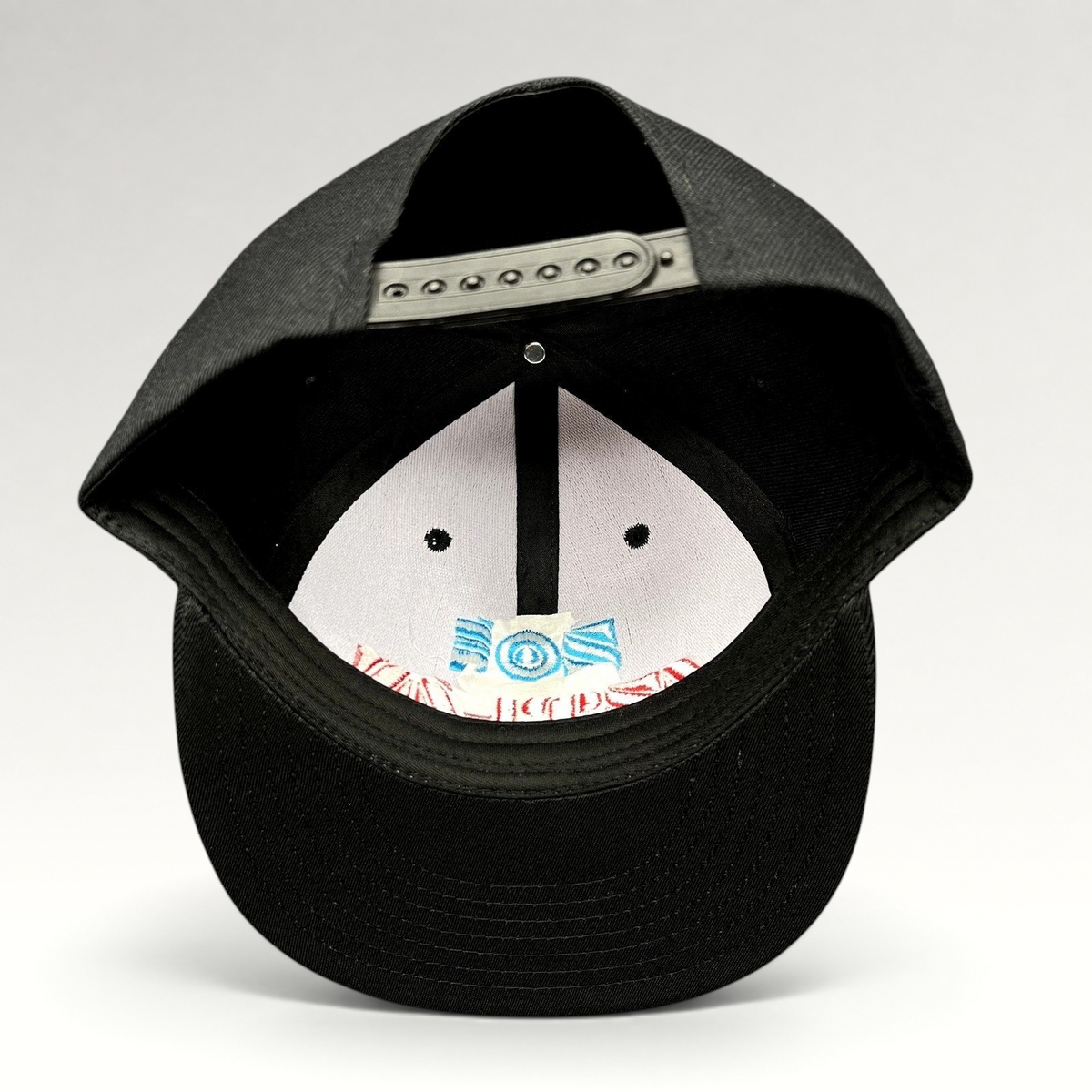 Raree Finds black Chokolids snapback hat featuring interior embroidered Zoé Aztlán album graphics on the front panel