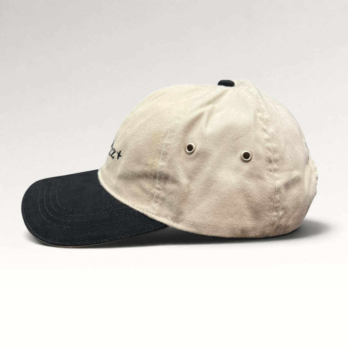 Side view showing metal ventilation eyelets