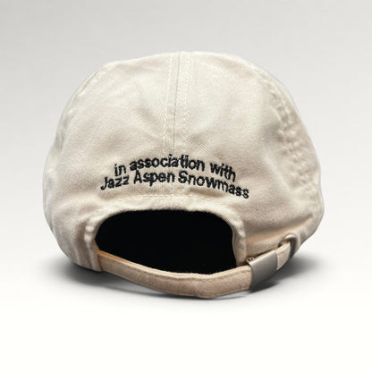 Rear embroidery reading In association with Jazz Aspen Snowmass and adjustable strap